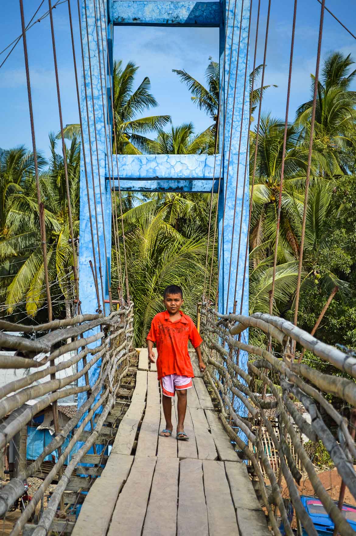 El Nido Philippines Travel Tips - boy on bridge